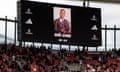 Screens show a picture in memory of schoolboy Daniel Anjorin at the Emirates stadium
