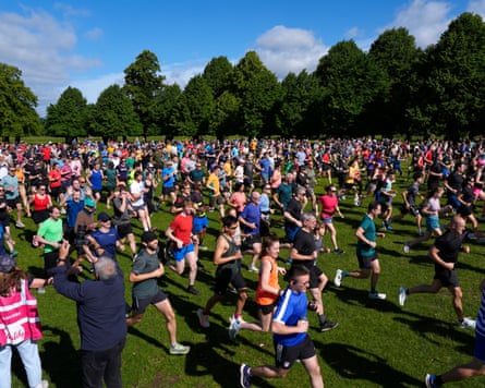 Runners take part in the Bushy Park parkrun in London, where the very first parkrun took place, to mark its one millionth event.