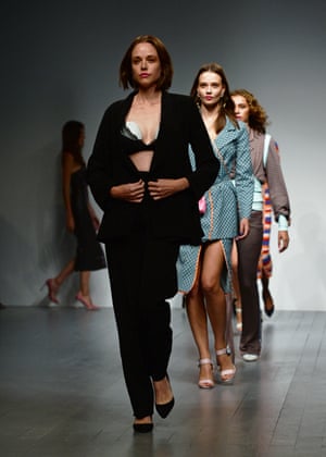 Valeria Garcia appearing on the catwalk wearing an Elvie breast pump