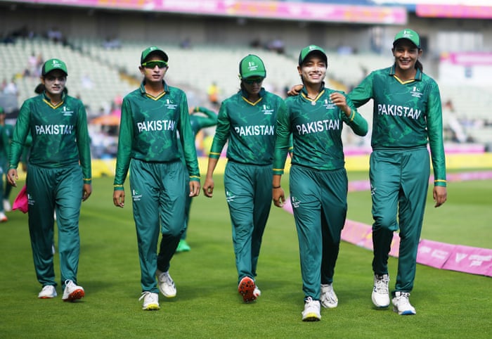 Sadia Iqbal and Fatima Sana Khan of Pakistan prepare to take to the field prior to the Cricket T20 Group A match between Australia and Pakistan.