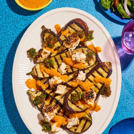 Grilled aubergine with grill-baked feta, harissa-tahini dressing and date salsa.