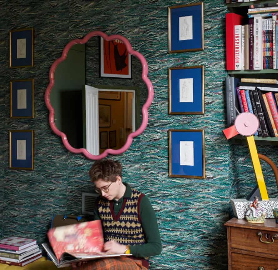 Interior designer and artist Luke Edward Hall in the bedroom of his London home