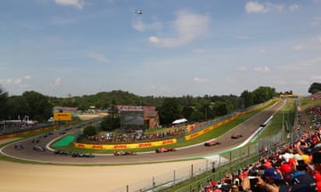 A general view as Charles Leclerc of Monaco driving the (16) Ferrari SF-24 leads Carlos Sainz of Spain driving (55) the Ferrari SF-24 and Oscar Piastri of Australia driving the (81) McLaren MCL38 Mercedes during the F1 Grand Prix of Emilia-Romagna.