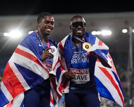 Romell Glave celebrates winning gold and Jeremiah Azu of Great Britain celebrates winning silver