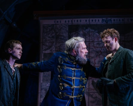 Marc Wootton, centre, goads the young men to action.