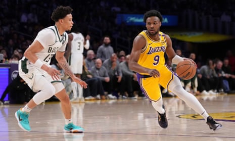Bronny James sets new career highs in depleted LA Lakers' loss to Bucks | Los Angeles Lakers | The Guardian