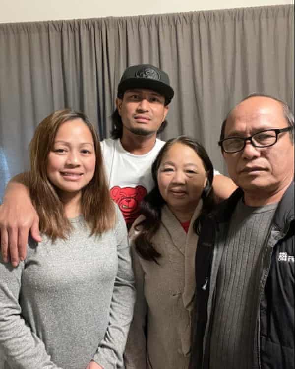 Bounchan Keola, second from left, with his sister, left, Thongsouk Keola, and parents after being released from prison.