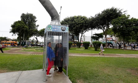 People breathe fresh air from a giant air purifier in Lima
