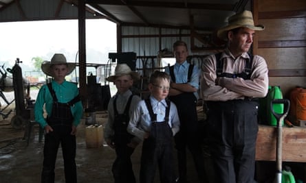 Mennonite boys carry out chores on the farm from a young age. By the age of 13 they are working full-time.
