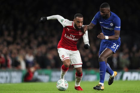 Alexandre Lacazette of Arsenal tussles with Antonio Rudiger of Chelsea.
