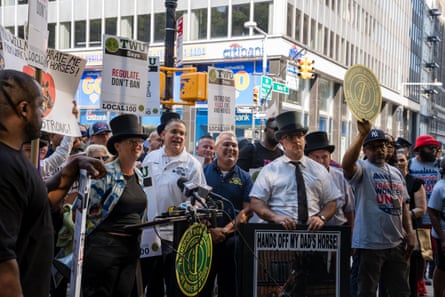 people hold signs outside
