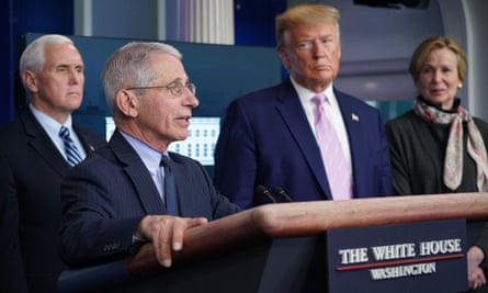 Fauci speaks as Mike Pence, Donald Trump and Dr Deborah Birx listen at the White House in April 2020.