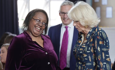 Malorie Blackman smiles at Queen Camilla.