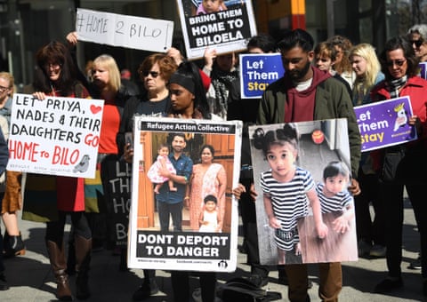 Demonstrators rally in support of the Biloela family at the federal  court in Melbourne