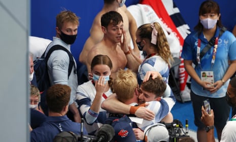 Tom Daley and Matty Lee of Team GB celebrate winning gold in Tokyo