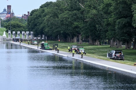 The Lincoln Memorial reflecting pool was still fended off from the public on 9 June, as workers put finishing touches on the troubled renovation.