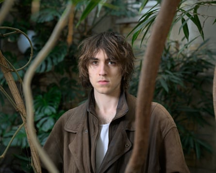 Man in brown jacket