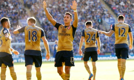 Arsenal’s Alexis Sánchez celebrates after completing his hat-trick at Leicester.