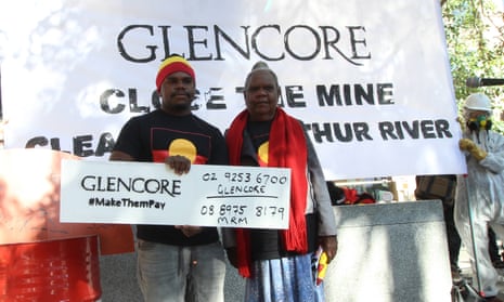 Protesters from the Northern Territory’s Borroloola Indigenous clan groups demand Glencore close and clean up its McArthur River Mine site in the Top End