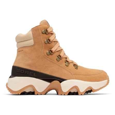 A side view of a Sorel Women’s KINETI IMPACT CONQUEST PLUS waterproof Sneaker boot facing right.