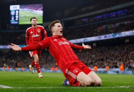 Elliot Anderson celebrates scoring against Manchester City in March