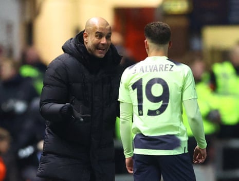 City manager Pep Guardiola speaks to Julian Alvarez.