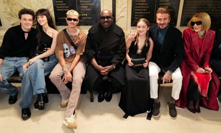 Brooklyn Beckham, Nicola Peltz Beckham, Romeo Beckham, Edward Enninful, Harper Beckham, David Beckham and Anna Wintour at the Victoria Beckham show.