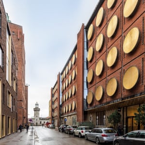Hotel Ottilia facade, with its 64 golden shileds, Carlsberg City District, Copenhagen, Denmark.
