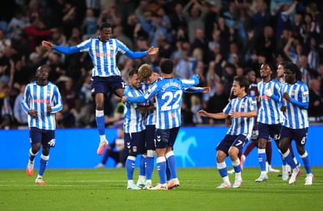 Victor Torp (centre left) celebrates with teammates after scoring Coventry City's equaliser against Aston Villa.