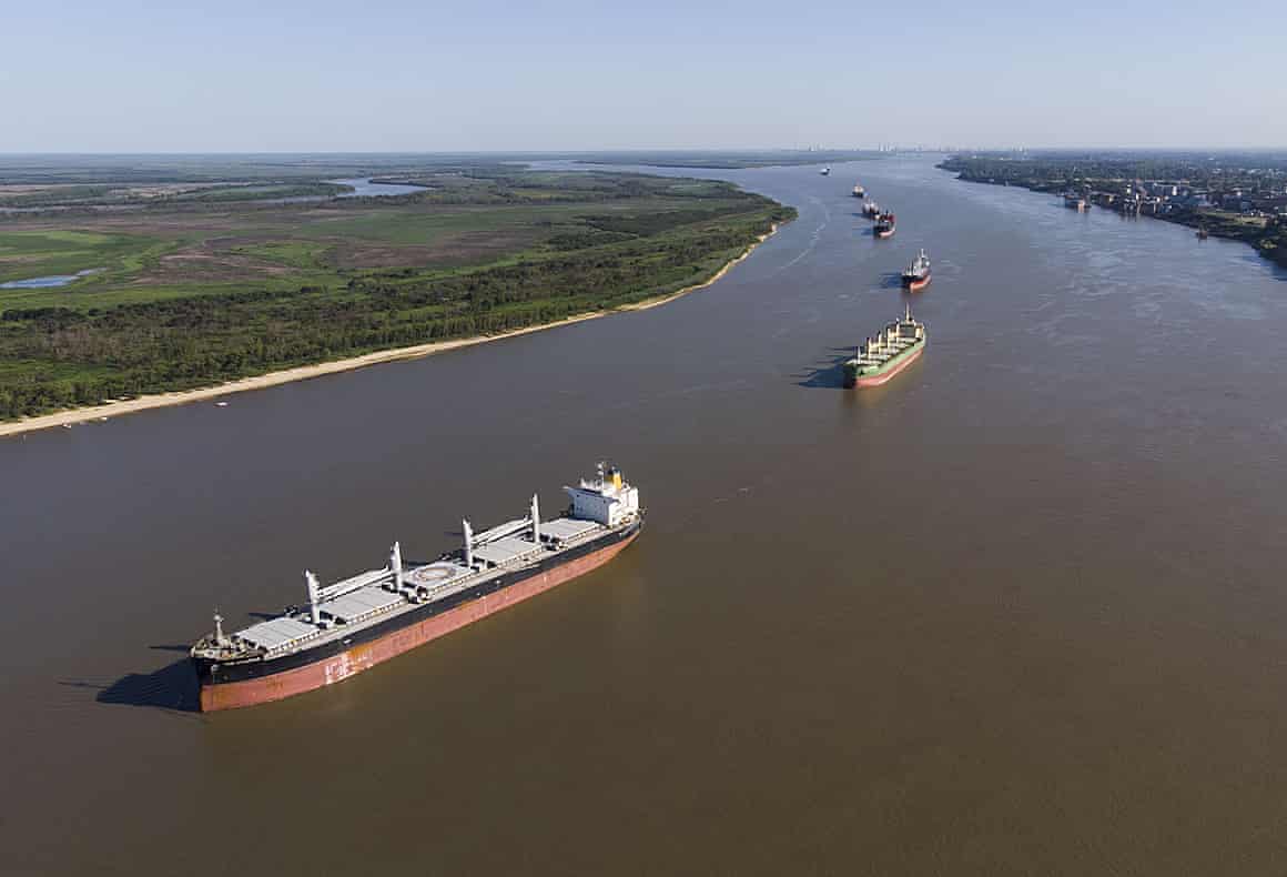 A line of vessels on the Paraná River, Argentina.