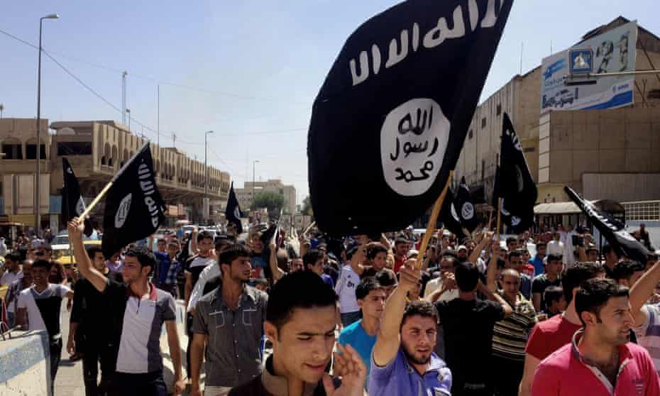 Pro-Islamic State demonstrators rally in front of the provincial government headquarters in Mosul, Iraq, in June 2014. The Iraqi army collapsed when confronted by Isis in Mosul last year.