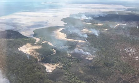 Smoke from bushfires along the coast of K’gari, also known as Fraser Island, off the Queensland coast.