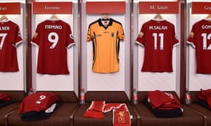 The yellow shirt of St Peter’s GAA, Dunboyne, hangs alongside the red of Liverpool.