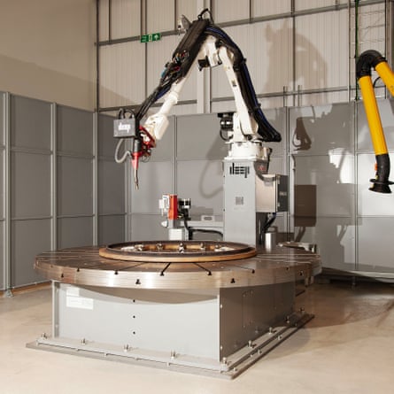 A mechanical arm in an industrial lab.