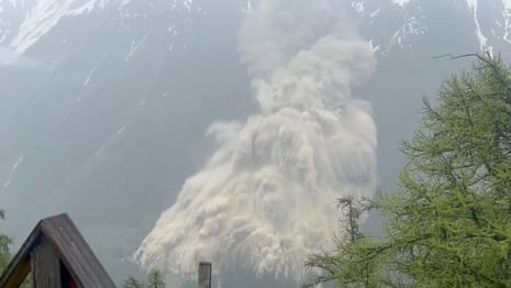 Glacier collapses, burying evacuated Swiss village in mud and rocks – video