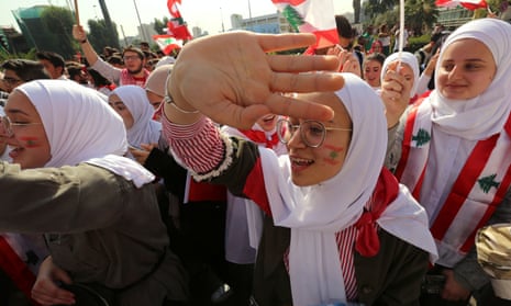 Students take part in an anti-government protest in Beirut