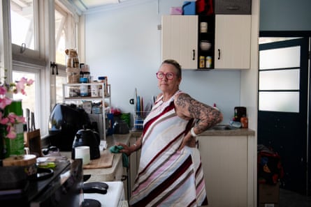 Kellie Holmes in the kitchen of her short-term rental.