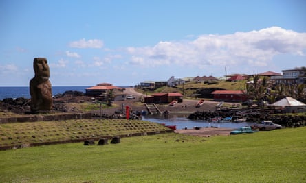 Moai statue and fishing village on Easter Island.