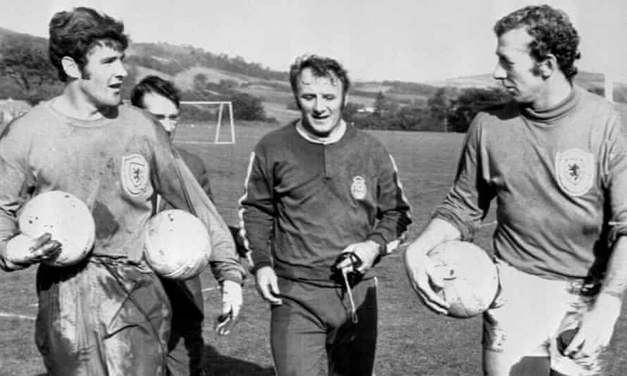 Tommy Docherty in October 1971, during his spell at Scotland manager. He is with the goalkeepers Bobby Clarke and Bob Wilson.