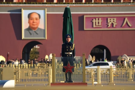 A Chinese soldier stands guard outside the Tiananmen Gate