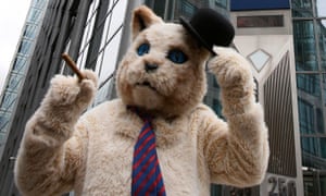 A protester in a ‘fat cat’ suit stands outside RBS in London, 2012