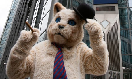 A protester in a ‘fat cat’ suit stands outside RBS in London, 2012