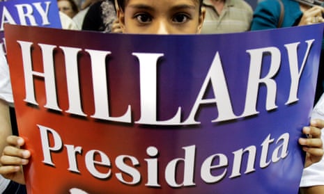 A young supporter holds a sign during a campaign rally for Hillary Clinton in Puerto Rico in May. She has won the territory’s primary, according to Associated Press.