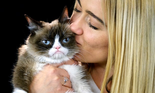 The late YouTube star Grumpy Cat with her owner Tabatha Bundesen