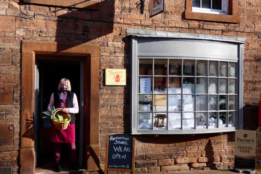 Shop exterior with volunteer