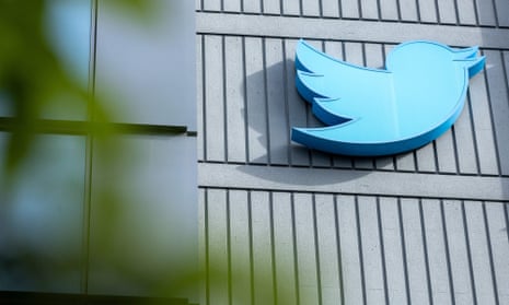 The Twitter logo is seen on a sign on the exterior of Twitter headquarters in San Francisco, California