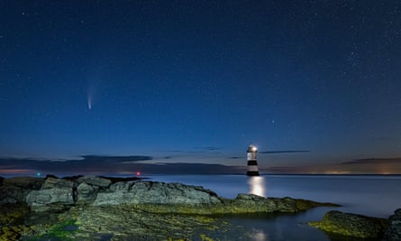 The Neowise Comet and starry sky over Penmon Point Lighthouse in Wales