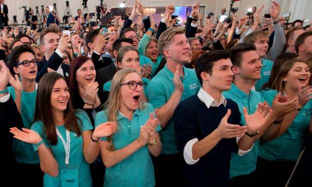 Supporters of Kurz react to the first results after the elections in Vienna on Sunday.