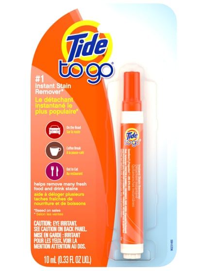 A Tide to go pen in orange and white packaging