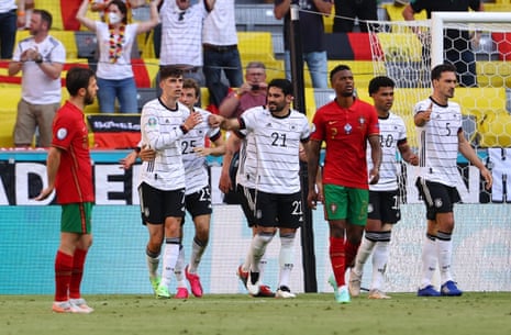 Germany’s Kai Havertz and teammates celebrate after Portugal’s Ruben Dias scores an own goal and equaliser for Germany.